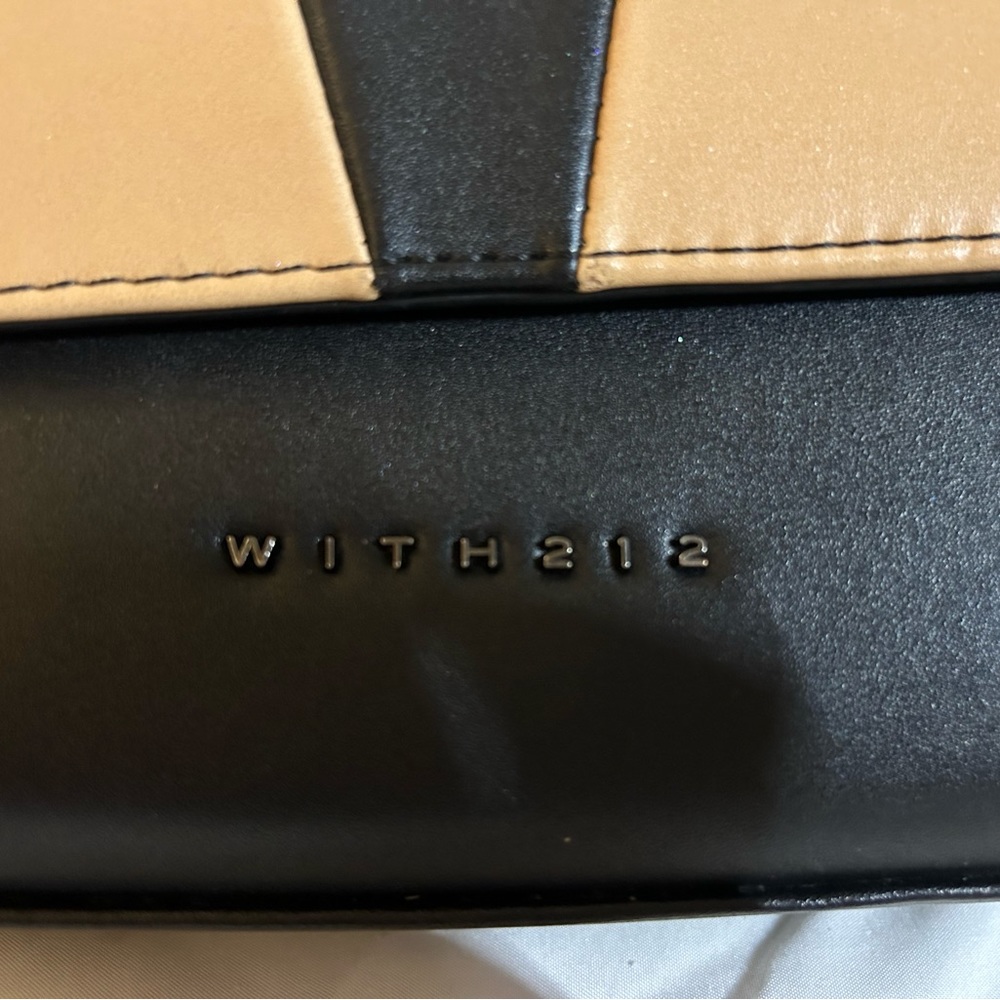With212 two toned cream and black crossbody purse, gently used